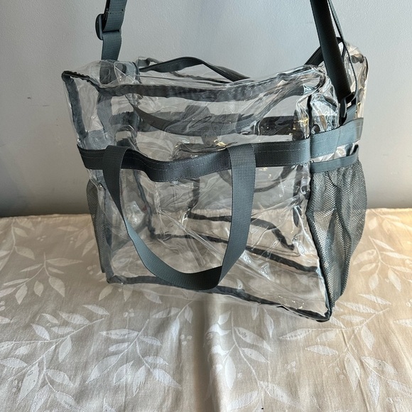 Clear bag. Perfect for concerts or baby bag. Side mesh holders and long strap. - Picture 7 of 7